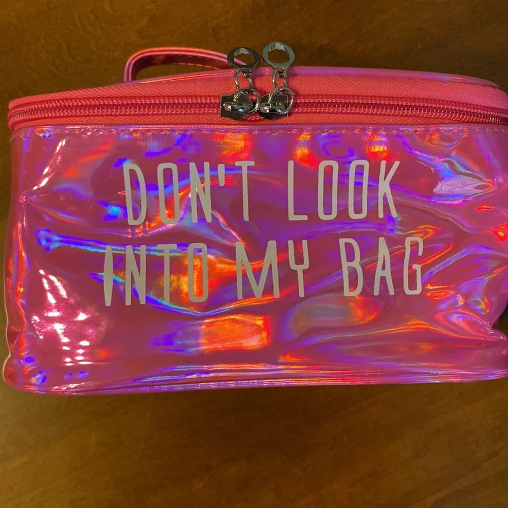 Don’t look into my bag! Holographic make up bag NWT